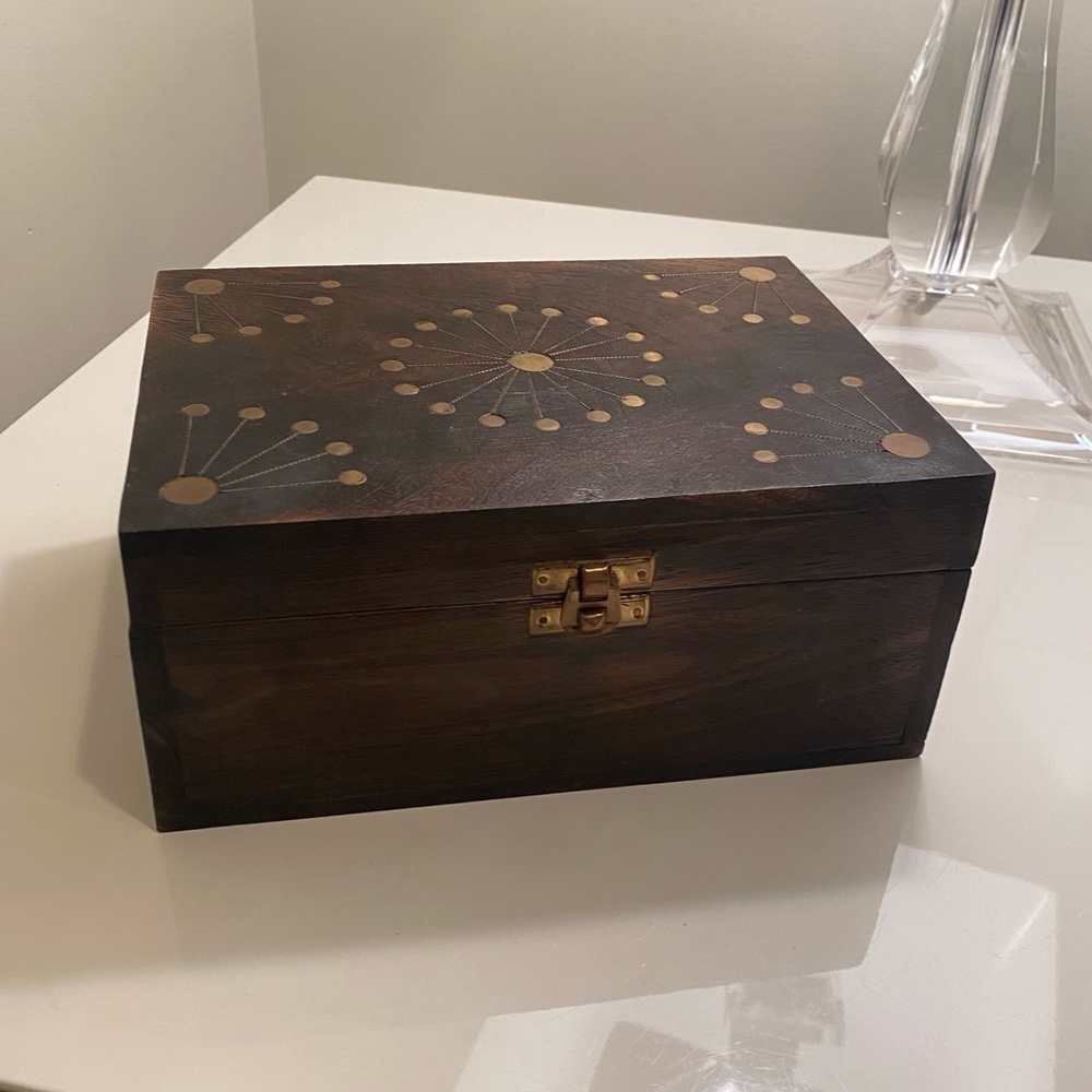 Dark wooden box with gold accent